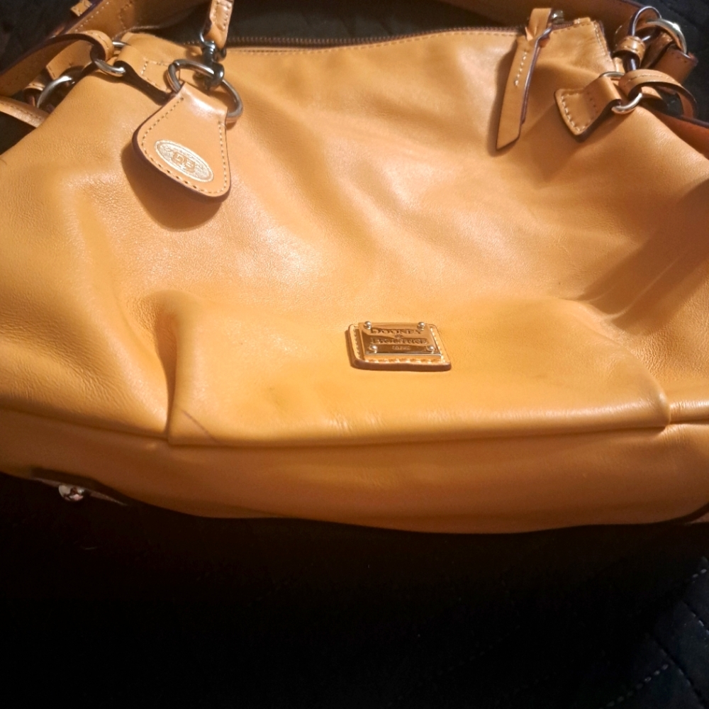Dooney &Bourke mustard vachetta leather plus key chain used good condition!!